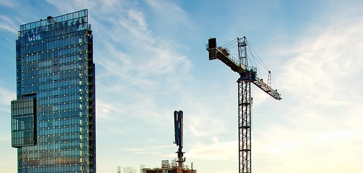 High-rise building and the crane