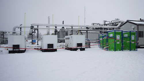 Nat gas generators at refinery job site.